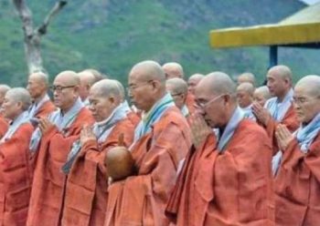 Korean Buddhist monks perform a ritual at a historical site in Haripur. From tribune.com.pk