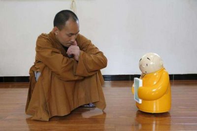 Master Xianfan of Longquan Monastery with the first generation model of Xian'er. From bosotonglobe.com