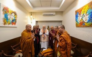 India's prime minister Narendra Modi with Buddhist monks