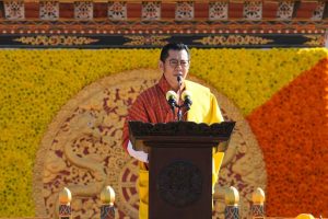 Bhutan’s King Jigme Khesar Namgyal Wangchuck at a podium