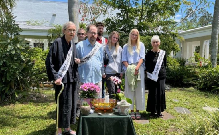 Rissho Kosei-kai Buddhist group members outside their temple